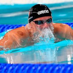 Nicolò Martinenghi je zmagovalec plavalne olimpijske preizkušnje na 100 metrov prsno (ANSA)