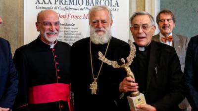 Msgr. Malnati med predstavniki verskih skupnosti (LUCA TEDESCHI/FOTODAMJ@N)